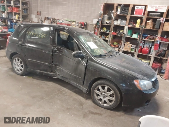 2005 Kia Spectra with VIN KNAFE161255083357, listed as a IAAI auction lot 41445285 with 90,349 mi miles. Bid and sale history available at carsss.com. Image 1.