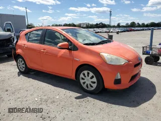 2012 Toyota Prius c One with VIN JTDKDTB35C1030051, listed as a Copart auction lot 52895065 with 94,529 mi miles and Salvage Title. Bid and sale history available at carsss.com. Image 4.