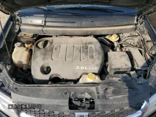 2015 Dodge Journey SXT with VIN 3C4PDCCG5FT559021, listed as a Copart auction lot 60101335 with 323,930 mi miles and Salvage title. Bid and sale history available at DreamBid. Image 12.
