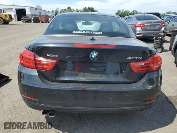2015 BMW 4 Series 428i xDrive z VIN WBA3T1C57FP820896, wystawiony jako Copart lot #62681495 z przebiegiem 147 357 mil mil oraz Szkoda całkowita • Salvage title. Historia ofert i sprzedaży dostępna na DreamBid. Obrazek 6.