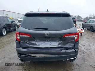 2021 Honda Pilot Touring 8-Passenger with VIN 5FNYF5H9XMB014190, listed as a IAAI auction lot 41749586 with 67,602 mi miles and . Bid and sale history available at DreamBid. Image 17.