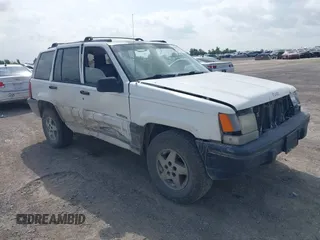 1994 Jeep Grand Cherokee Laredo with VIN 1J4FX58SXRC120936, listed as a IAAI auction lot 42530212 with 126,367 mi miles and . Bid and sale history available at DreamBid. Image 1.