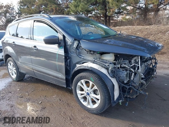 2018 Ford Escape SE with VIN 1FMCU0GD5JUC46932, listed as a IAAI auction lot 41749296 with 111,236 mi miles. Bid and sale history available at carsss.com. Image 1.
