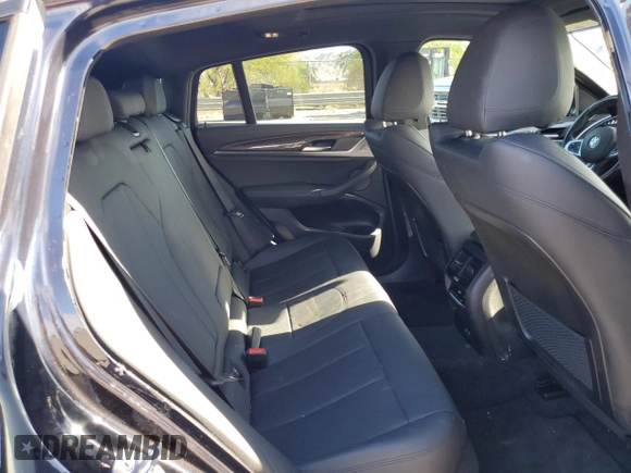 2021 BMW X4 M40i with VIN 5UX2V5C06M9E04443, listed as a Copart auction lot 72061194 with 71,637 mi miles and Salvage title. Bid and sale history available at DreamBid. Image 11.