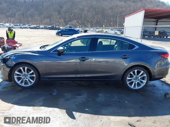 2016 Mazda Mazda6 i Touring with VIN JM1GJ1V57G1460363, listed as a IAAI auction lot 41742896 with 145,819 mi miles. Bid and sale history available at carsss.com. Image 14.