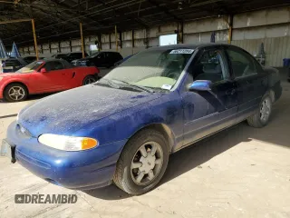 1996 Ford Contour LX with VIN 1FALP6537TK218045, listed as a Copart auction lot 66577225 with 62,008 mi miles and Clean title. Bid and sale history available at DreamBid. Image 1.