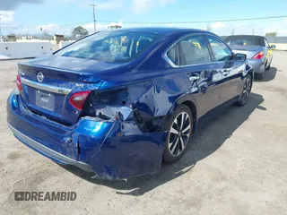 2018 Nissan Altima 2.5 S with VIN 1N4AL3AP3JC142423, listed as a IAAI auction lot 41793851 with 61,391 mi miles. Bid and sale history available at carsss.com. Image 4.