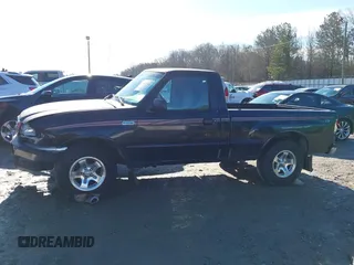 1998 Mazda B-Series 2WD Truck SX with VIN 4F4YR12C4WTM47743, listed as a IAAI auction lot 41430832 with 318,909 mi miles. Bid and sale history available at carsss.com. Image 15.