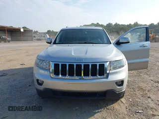 2011 Jeep Grand Cherokee Laredo with VIN 1J4RR4GG2BC514497, listed as a IAAI auction lot 42688206 with 88,822 mi miles and . Bid and sale history available at DreamBid. Image 6.