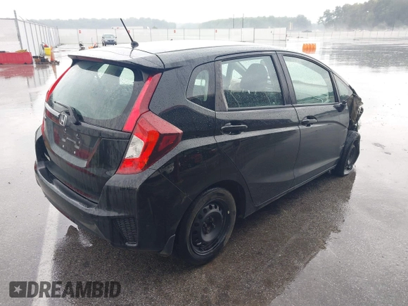 2015 Honda Fit LX with VIN 3HGGK5H56FM760513, listed as a IAAI auction lot 42431169 with 69,841 mi miles and . Bid and sale history available at DreamBid. Image 4.