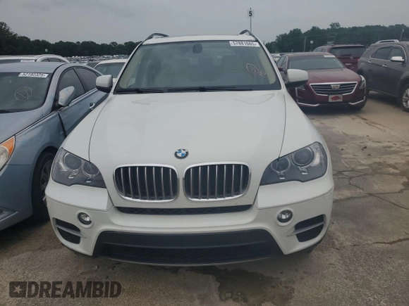 2013 BMW X5 xDrive35i z VIN 5UXZV4C59D0B21124, wystawiony jako Copart lot #57881665 z przebiegiem 41 277 mil mil oraz Tytuł czysty. Historia ofert i sprzedaży dostępna na DreamBid. Obrazek 5.