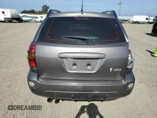 2005 Pontiac Vibe z VIN 5Y2SL63855Z404970, wystawiony jako Copart lot #56750875 z przebiegiem 128 636 mil mil oraz Szkoda całkowita • Salvage title. Historia ofert i sprzedaży dostępna na DreamBid. Obrazek 6.