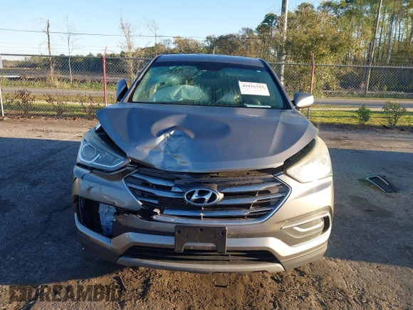 2018 Hyundai Santa Fe 2.4L z VIN 5NMZTDLB8JH098926, wystawiony jako IAAI lot #41816513 z przebiegiem 92 920 mil mil oraz . Historia ofert i sprzedaży dostępna na DreamBid. Obrazek 13.