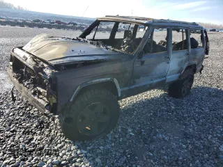 1996 Jeep Cherokee Sport with VIN 1J4FJ68S1TL279827, listed as a Copart auction lot 46613905 with 0 mi miles and Salvage Title. Bid and sale history available at carsss.com. Image 1.