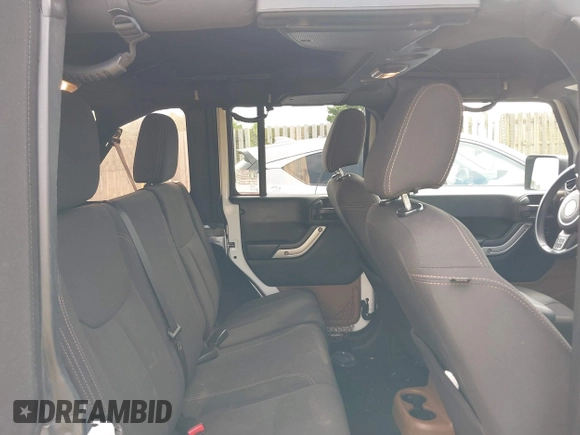 2018 Jeep Wrangler Unlimited Altitude with VIN 1C4HJWEGXJL870606, listed as a IAAI auction lot 42693031 with 92,735 mi miles and . Bid and sale history available at DreamBid. Image 8.
