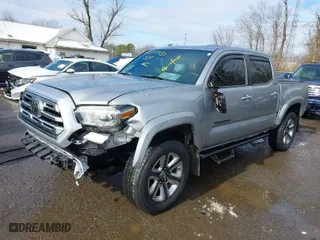 2019 Toyota Tacoma 4WD SR with VIN 3TMGZ5AN7KM287140, listed as a IAAI auction lot 41541937 with 41,843 mi miles. Bid and sale history available at carsss.com. Image 2.