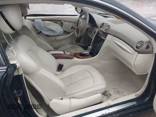 2007 Mercedes-Benz CLK-Class 5.5L with VIN WDBTJ72H77F214706, listed as a IAAI auction lot 41471332 with 87,310 mi miles. Bid and sale history available at carsss.com. Image 5.