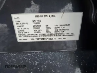 2023 Tesla Model Y Long Range with VIN 7SAYGDEE6PF752570, listed as a Copart auction lot 84927794 with 52,297 mi miles and Salvage Title. Bid and sale history available at DreamBid. Image 12.
