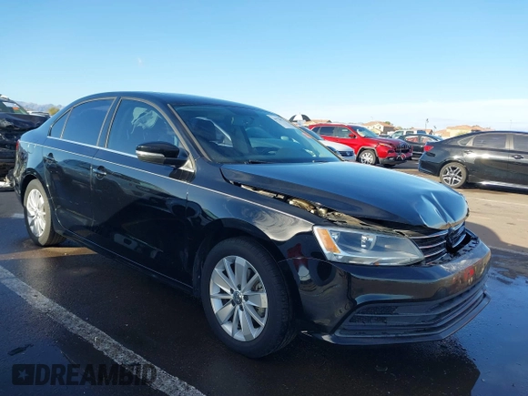 2015 Volkswagen Jetta Sedan 1.8T SE with VIN 3VWD17AJ9FM341950, listed as a IAAI auction lot 41778772 with 121,954 mi miles. Bid and sale history available at carsss.com. Image 1.