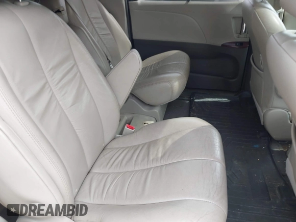 2012 Toyota Sienna XLE AAS with VIN 5TDYK3DC1CS199113, listed as a IAAI auction lot 42123757 with 211,723 mi miles and . Bid and sale history available at carsss.com. Image 8.