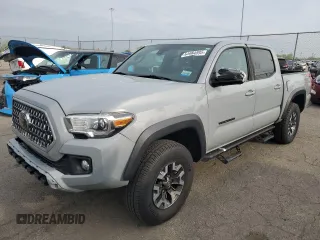 2019 Toyota Tacoma SR z VIN 3TMCZ5AN0KM227229, wystawiony jako Copart lot #54984895 z przebiegiem 244 400 mil mil oraz Tytuł czysty. Historia ofert i sprzedaży dostępna na DreamBid. Obrazek 1.