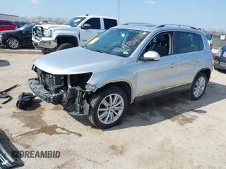 2013 Volkswagen Tiguan SE with VIN WVGAV7AX4DW545658, listed as a IAAI auction lot 41523168 with 188,729 mi miles and . Bid and sale history available at DreamBid. Image 2.