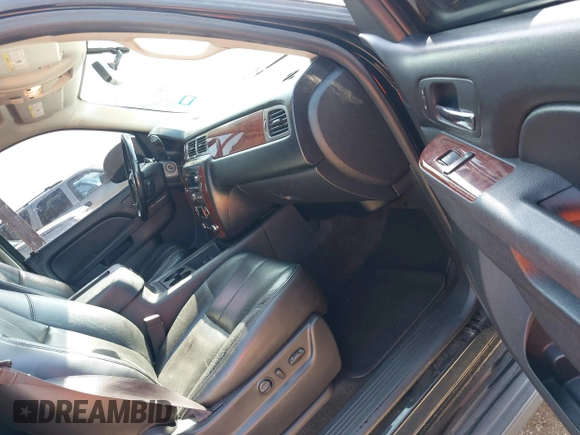 2014 Chevrolet Suburban LT with VIN 1GNSCJE03ER203943, listed as a IAAI auction lot 41982720 with 288,135 mi miles and . Bid and sale history available at DreamBid. Image 5.