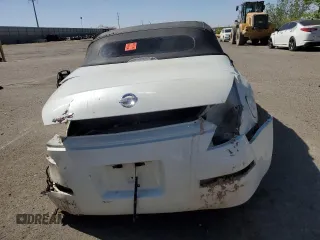 2005 Nissan 350Z Touring z VIN JN1AZ36A15M754779, wystawiony jako Copart lot #52346015 z przebiegiem Nie podano mil oraz Szkoda całkowita • Salvage title. Historia ofert i sprzedaży dostępna na DreamBid. Obrazek 6.