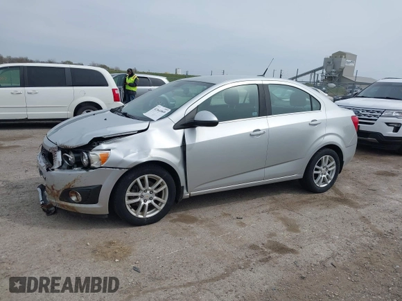 2012 Chevrolet Sonic LT with VIN 1G1JC5SHXC4170853, listed as a IAAI auction lot 41941069 with 130,917 mi miles and . Bid and sale history available at DreamBid. Image 2.
