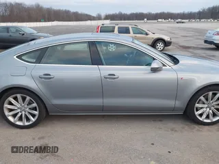 2014 Audi A7 Premium Plus z VIN WAUWGAFC9EN096702, wystawiony jako IAAI lot #41202201 z przebiegiem 103 893 mil mil oraz . Historia ofert i sprzedaży dostępna na DreamBid. Obrazek 13.