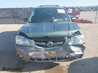 2004 Mazda Tribute ES with VIN 4F2CZ06184KM32333, listed as a IAAI auction lot 42041183 with 33,646 mi miles. Bid and sale history available at carsss.com. Image 6.