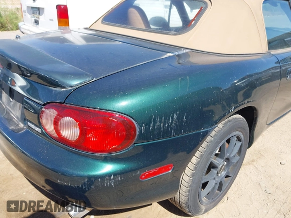 2001 Mazda MX-5 Miata with VIN JM1NB353410202216, listed as a IAAI auction lot 42126191 with Not Provided miles and . Bid and sale history available at DreamBid. Image 6.