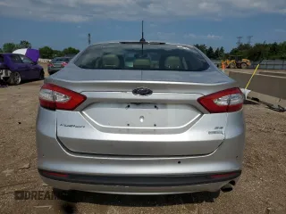 2016 Ford Fusion SE z VIN 3FA6P0HDXGR369218, wystawiony jako Copart lot #61225875 z przebiegiem 176 559 mil mil oraz Szkoda całkowita • Salvage title. Historia ofert i sprzedaży dostępna na DreamBid. Obrazek 6.