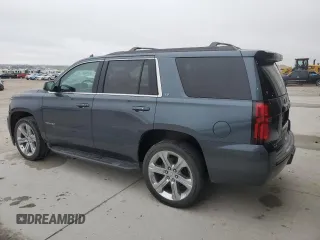 2019 Chevrolet Tahoe LT with VIN 1GNSKBKCXKR212450, listed as a Copart auction lot 54433205 with 119,907 mi miles and Salvage title. Bid and sale history available at DreamBid. Image 2.