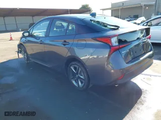 2020 Toyota Prius L Eco with VIN JTDKARFU5L3104460, listed as a IAAI auction lot 41298045 with 79,412 mi miles. Bid and sale history available at carsss.com. Image 3.