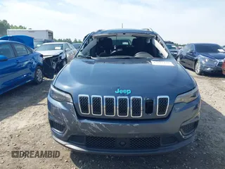 2021 Jeep Cherokee Latitude z VIN 1C4PJLCB5MD155930, wystawiony jako IAAI lot #42091426 z przebiegiem 77 302 mil mil oraz . Historia ofert i sprzedaży dostępna na DreamBid. Obrazek 6.