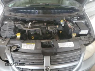 2006 Dodge Grand Caravan SE z VIN 1D4GP24RX6B719836, wystawiony jako Copart lot #56561705 z przebiegiem 141 033 mil mil oraz Szkoda całkowita • Salvage title. Historia ofert i sprzedaży dostępna na DreamBid. Obrazek 12.