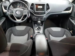 2014 Jeep Cherokee Altitude with VIN 1C4PJMCSXEW124863, listed as a Copart auction lot 82432534 with 194,559 mi miles and Salvage Title. Bid and sale history available at carsss.com. Image 8.