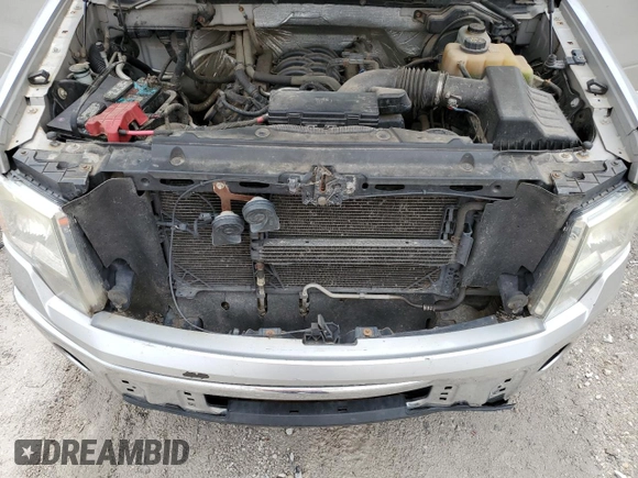 2012 Ford F-150 XL with VIN 1FTFX1EF2CFA00320, listed as a Copart auction lot 51511465 with 228,571 mi miles and Salvage title. Bid and sale history available at DreamBid. Image 13.