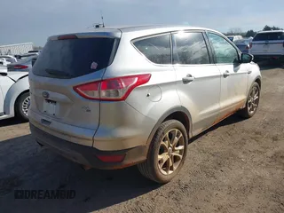 2013 Ford Escape SEL with VIN 1FMCU9H92DUD87086, listed as a IAAI auction lot 41614977 with 100,478 mi miles and . Bid and sale history available at DreamBid. Image 4.