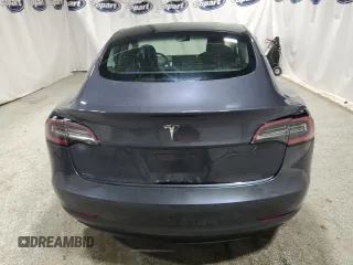 2022 Tesla Model 3 with VIN 5YJ3E1EA8NF287506, listed as a Copart auction lot 55674145 with 106,745 mi miles and Clean Title. Bid and sale history available at DreamBid. Image 6.