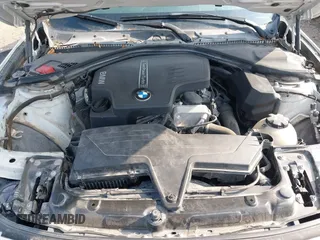 2015 BMW 3 Series 320i with VIN WBA3B1G5XFNT05903, listed as a IAAI auction lot 42063574 with Not Provided miles. Bid and sale history available at carsss.com. Image 10.