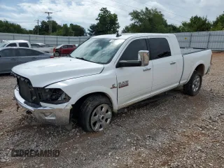 2015 Ram 2500 Laramie with VIN 3C6UR5NL4FG569422, listed as a Copart auction lot 62017655 with 100,400 mi miles and Salvage title. Bid and sale history available at DreamBid. Image 1.