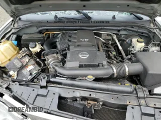 2014 Nissan Frontier SL z VIN 1N6AD0FVXEN713474, wystawiony jako Copart lot #72999424 z przebiegiem 155 115 mil mil oraz Szkoda całkowita • Salvage title. Historia ofert i sprzedaży dostępna na DreamBid. Obrazek 11.