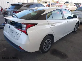 2019 Toyota Prius L Eco with VIN JTDKARFU8K3102331, listed as a IAAI auction lot 41852084 with 54,275 mi miles. Bid and sale history available at carsss.com. Image 4.