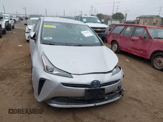 2022 Toyota Prius L Eco with VIN JTDKAMFU9N3185999, listed as a IAAI auction lot 41428106 with 50,798 mi miles. Bid and sale history available at carsss.com. Image 12.