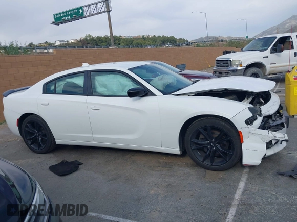 2018 Dodge Charger SXT Plus with VIN 2C3CDXHG4JH187580, listed as a IAAI auction lot 42024602 with 203,843 mi miles and . Bid and sale history available at carsss.com. Image 13.