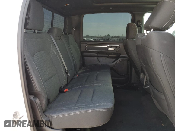 2023 Ram 1500 Limited with VIN 1C6SRFHT1PN576104, listed as a Copart auction lot 48064355 with 23,874 mi miles and Salvage title. Bid and sale history available at DreamBid. Image 10.