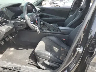 2023 Hyundai Elantra N with VIN KMHLW4AK9PU014867, listed as a Copart auction lot 49674295 with 46,886 mi miles and Salvage Title. Bid and sale history available at carsss.com. Image 7.