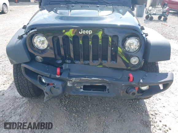 2017 Jeep Wrangler Unlimited Rubicon Recon z VIN 1C4HJWFG4HL507601, wystawiony jako IAAI lot #42258921 z przebiegiem 106 122 mil mil oraz . Historia ofert i sprzedaży dostępna na DreamBid. Obrazek 6.